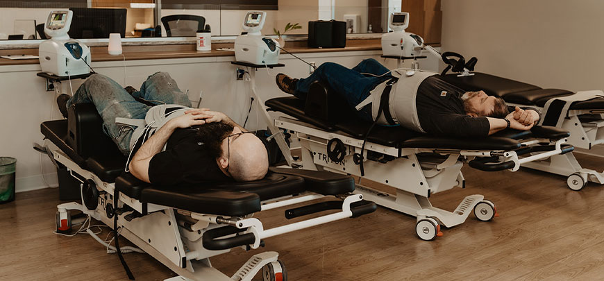 patient receiving spinal decompression therapy as part of the neuropathy treatment protocol at Monumental Health and Wellness in Colville